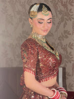The Crimson Noor Heritage Bridal Lehenga (or The Royal Maroon Hand-Embroidered Velvet & Net Bridal Set)